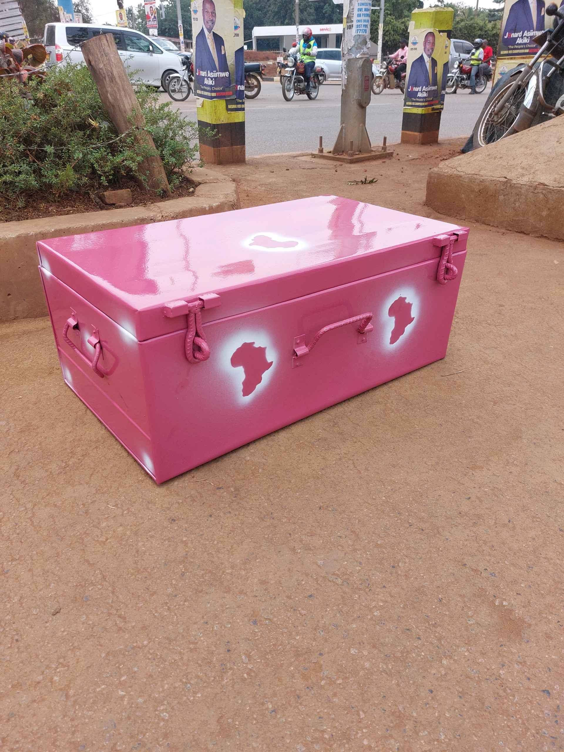 Medium metallic suitcases in pink