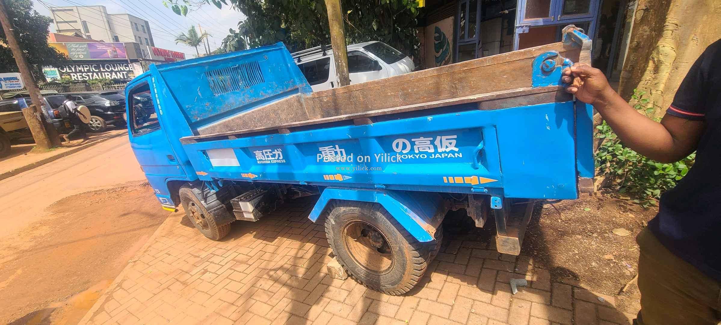 Isuzu elf tipper or dumper